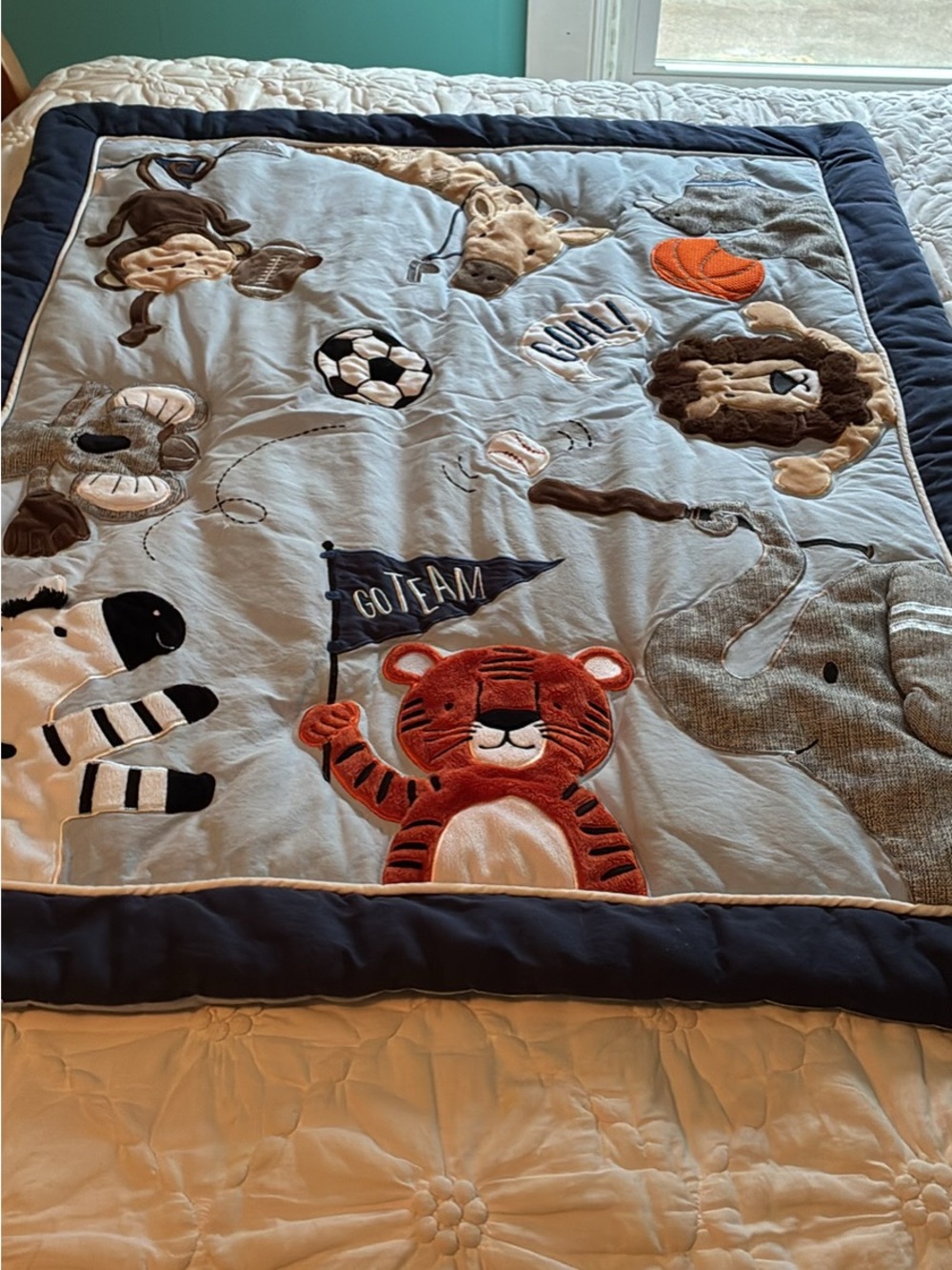 crown & ivy Kids Animal Sports Quilt - Light Blue, Navy & Orange Accents